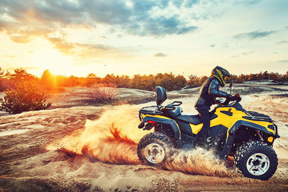 ATV riding through dirt