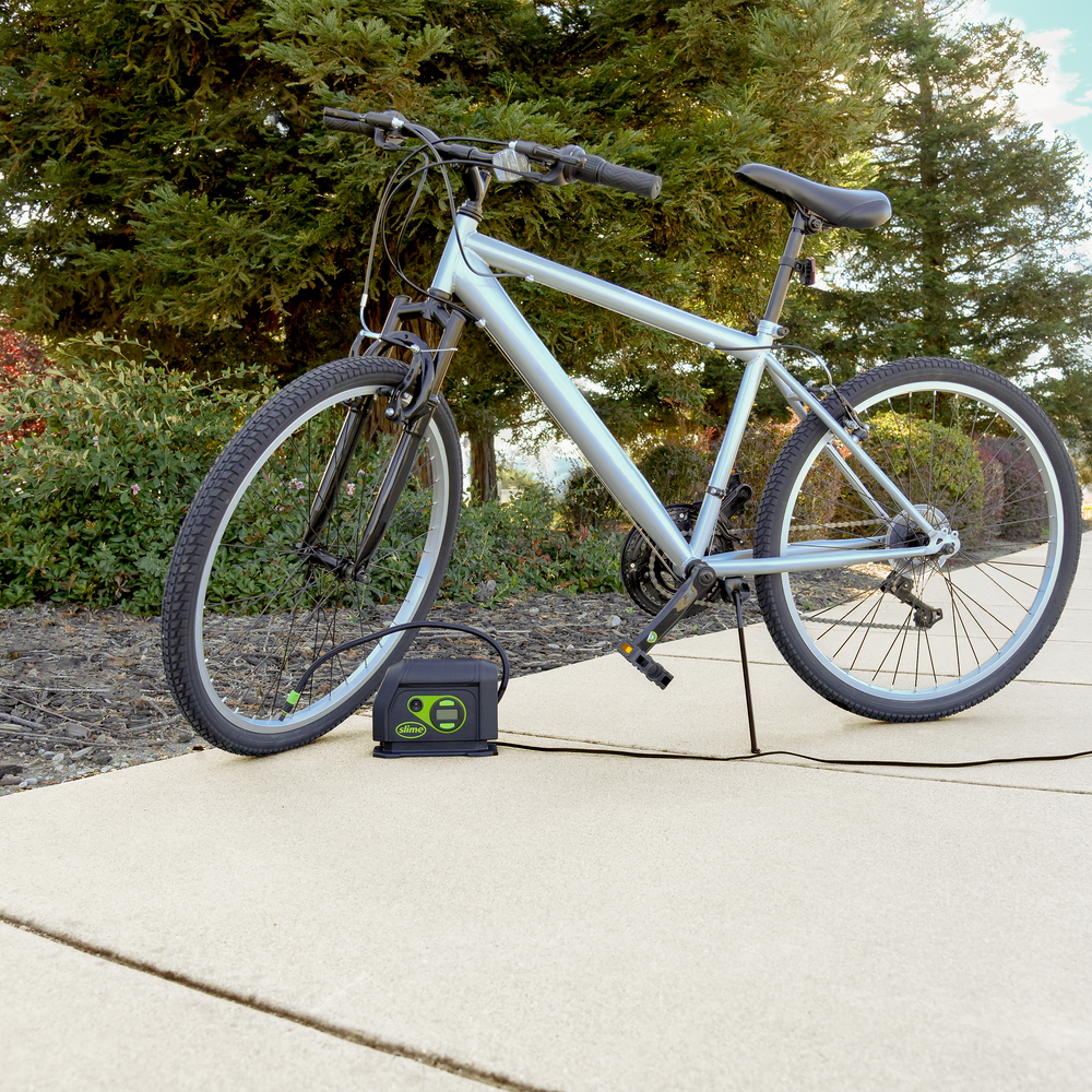 
            
                Load image into Gallery viewer, Slime 12V Digital Tire Inflator #40051 In Use Bike
            
        