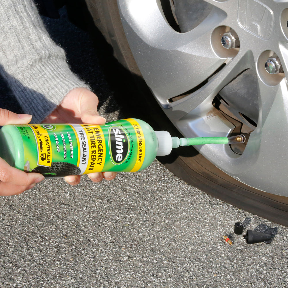 
            
                Load image into Gallery viewer, Slime Emergency Tire Sealant - 16 oz. (Car/Trailer) #10011 Install
            
        