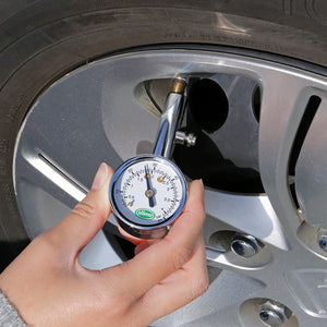 
            
                Load image into Gallery viewer, Slime Dial Tire Gauge (5-60 psi) #20048T In UseSlime Mini Dial Tire Gauge (5-60 psi) #20048T In Use
            
        