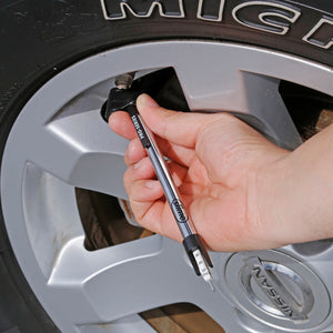 
            
                Load image into Gallery viewer, Slime Pro-Series 4-Way Pencil Tire Gauge (10-120 psi) #20455 In Use on Tire
            
        