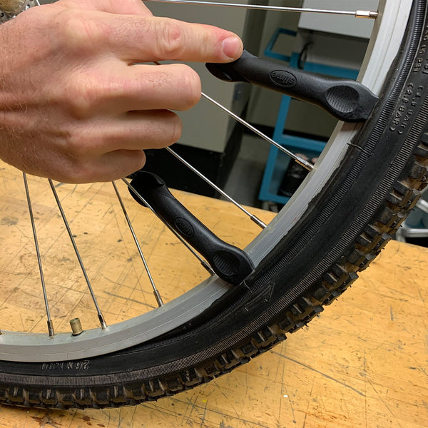 Slime peel and stick patches with two tire levers