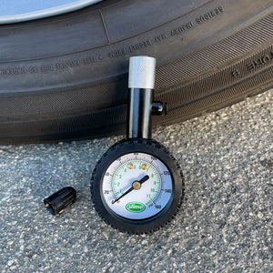 Elite High Pressure Tire Gauge (10-160 psi) Next to Tire