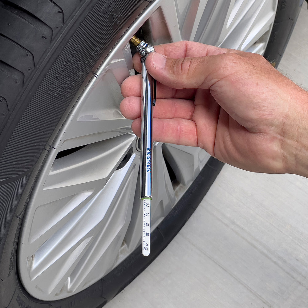 
            
                Load image into Gallery viewer, Slime Chrome Pencil Tire Gauge (5-50 psi) #22012 In Use
            
        